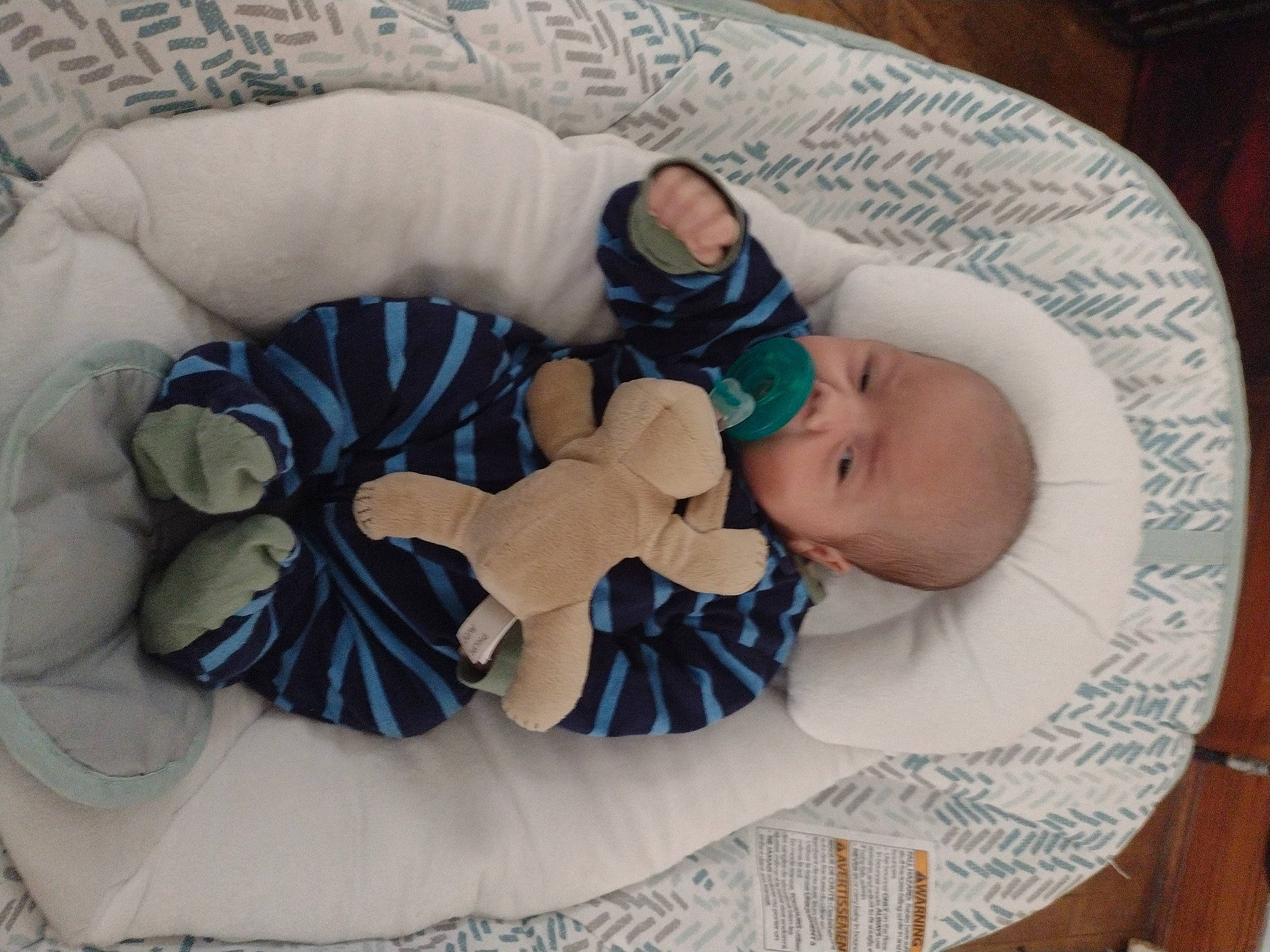 Dillian is registered to the contest to win money with this photo: arm, baby, baby_products, baby_sleeping, baby_toddler_clothing, bedding, bedtime, child, comfort, hand, headgear, infant_bed, linens, nap, pattern, person, room, sitting, textile, toddler