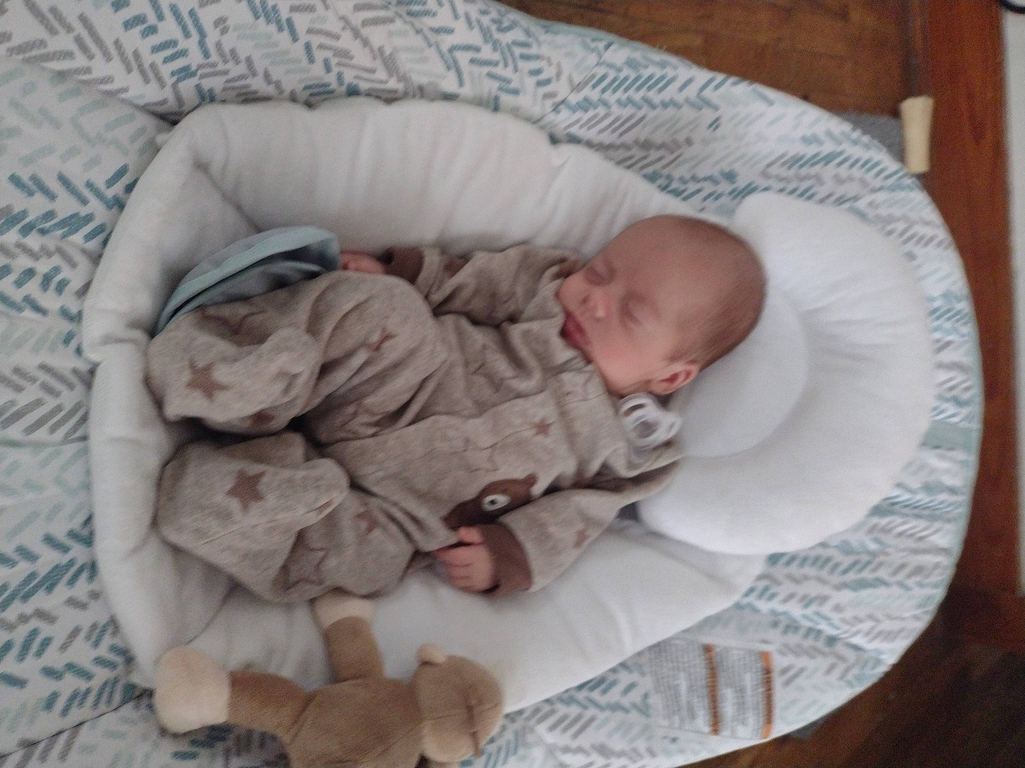 Rickie is registered to the contest to win money with this photo: baby, baby_products, baby_sleeping, baby_toddler_clothing, bedding, bedtime, child, comfort, linens, nap, pattern, person, room, sitting, sleep, sleeve, toddler