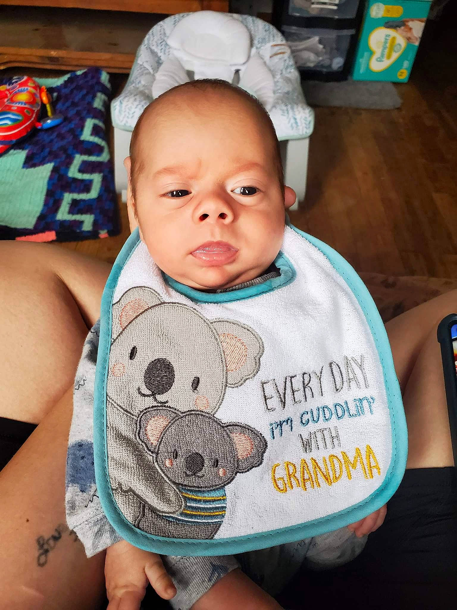 Rickie is registered to the contest to win money with this photo: abdomen, baby, baby_toddler_clothing, cheek, child, chin, comfort, cool, eye, happy, head, iris, mouth, neck, nose, person, skin, sleeve, t_shirt, thigh