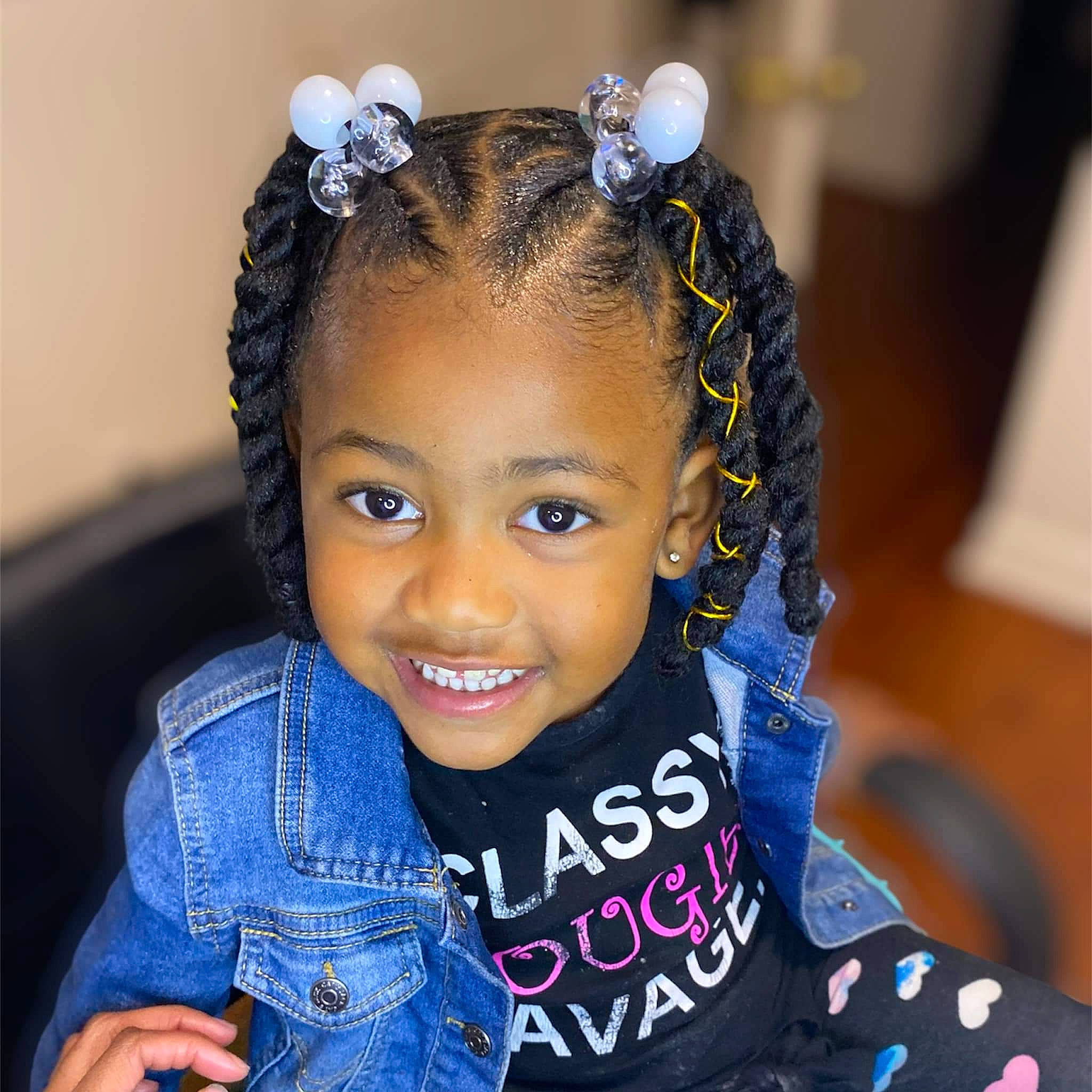 Seana is registered to the contest to win money with this photo: audio_equipment, baby_toddler_clothing, black_hair, cheek, child, cool, ear, electric_blue, eyebrow, eyelash, fashion_accessory, fun, hair, hair_tie, happy, jewellery, joy, person, sleeve, smile