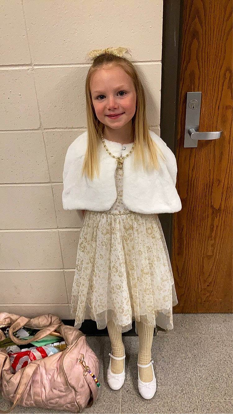 Claira joined the competition — help win amazing prizes! baby_toddler_clothing, blond, brown_hair, child, clothing, dress, face, fashion_accessory, fawn, flooring, fur, happy, joy, pattern, person, pink, room, sleeve, smile, toddler