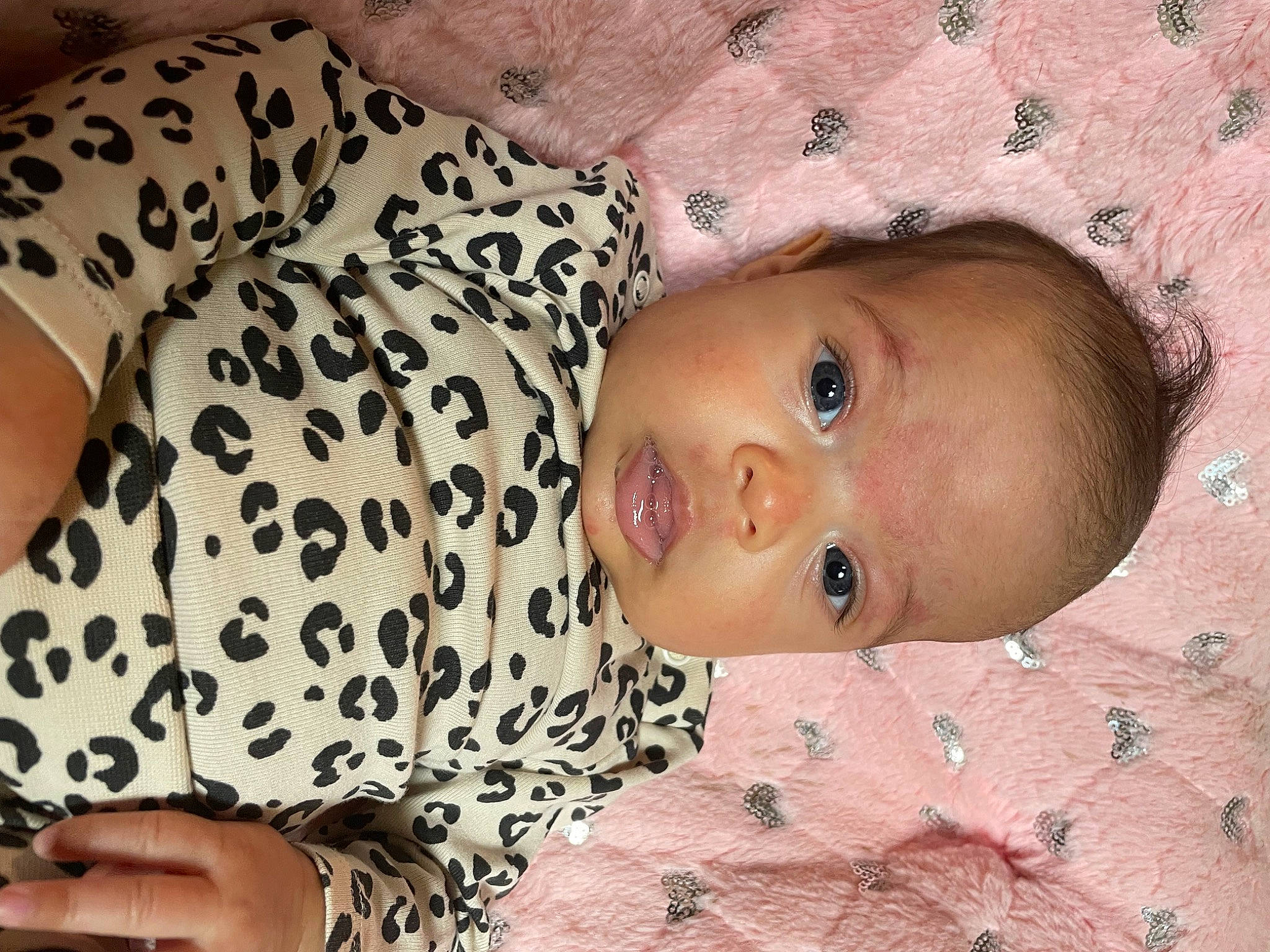 Maylene is registered to the contest to win money with this photo: baby, baby_toddler_clothing, cheek, child, close_up, eyebrow, eyelash, head, iris, linens, lip, mammal, mouth, nose, pattern, person, skin, sleeve, toddler, vertebrate