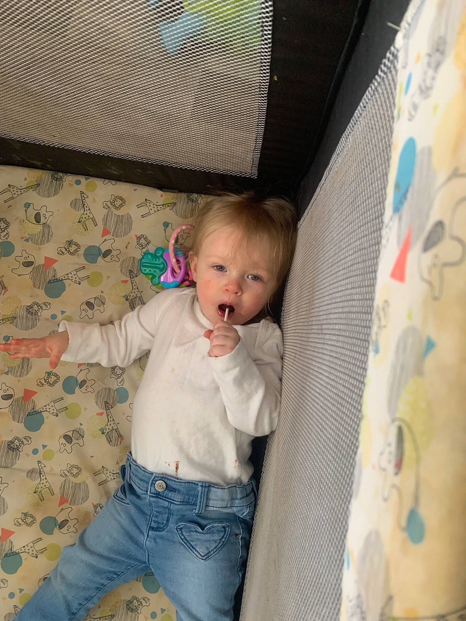 Eleanor is registered to the contest to win money with this photo: baby, baby_toddler_clothing, comfort, couch, flooring, fun, infant_bed, linens, mammal, organ, pattern, person, product, room, skin, sleeve, surprise, t_shirt, textile, toddler