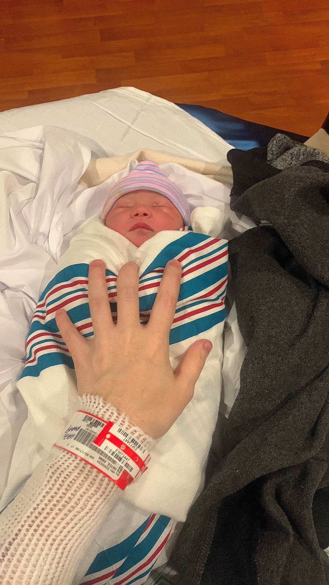 Everleigh joined the competition — help win amazing prizes! baby, baby_products, baby_sleeping, baby_toddler_clothing, bedtime, child, comfort, finger, headwear, health_care, linens, medical, nail, pattern, person, service, skin, sleeve, textile, thumb