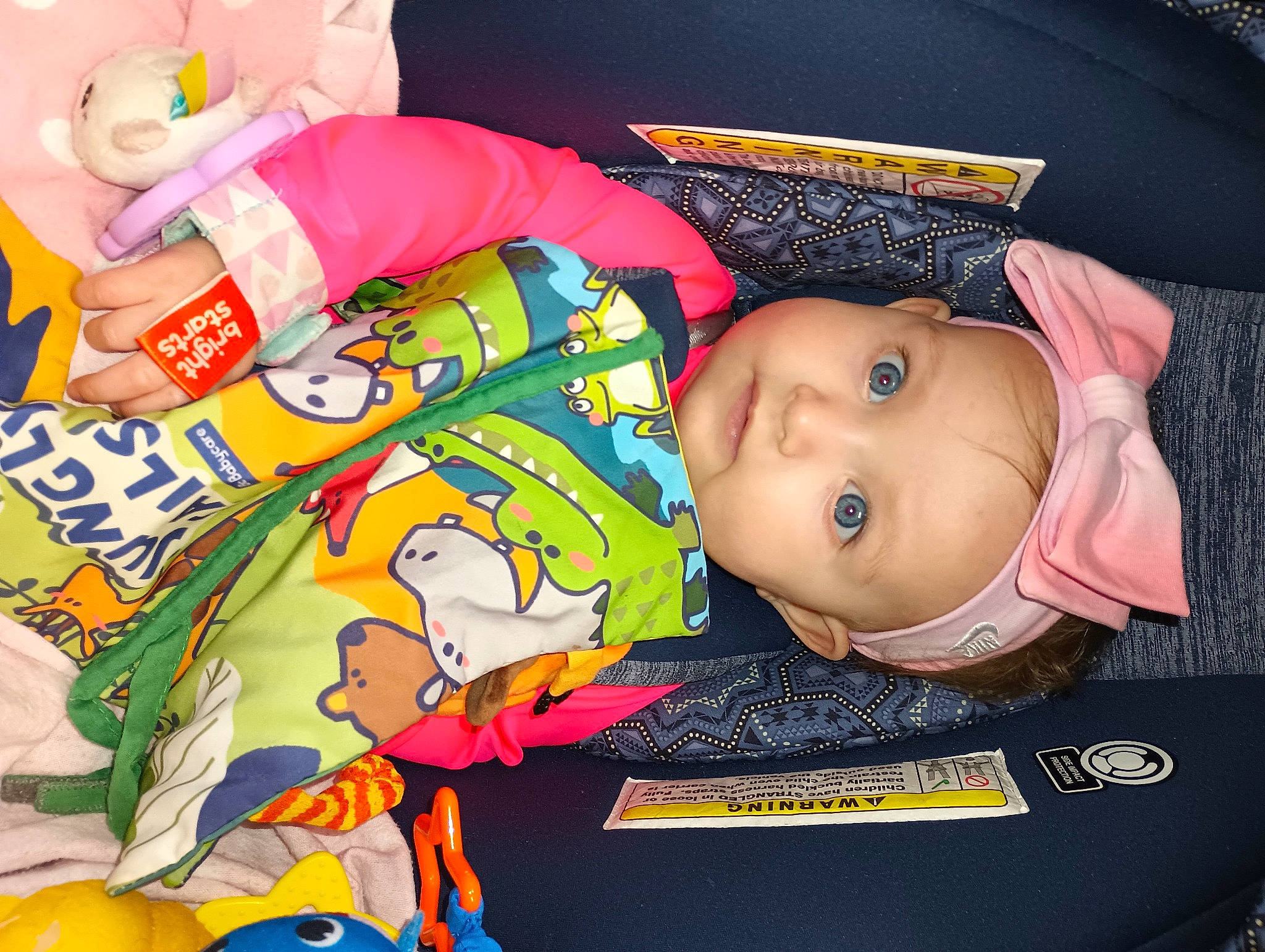 Gracelynn is registered to the contest to win money with this photo: art, baby, baby_products, baby_toddler_clothing, baby_toys, cheek, child, comfort, linens, orange, person, play, product, room, textile, toddler