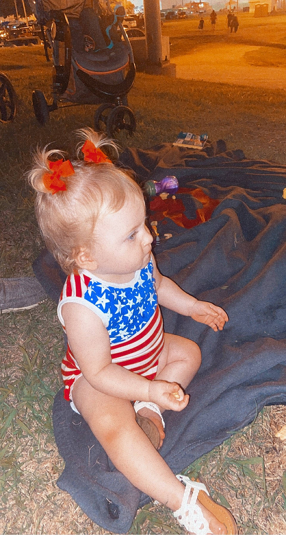Addison is registered to the contest to win money with this photo: abdomen, baby, baby_toddler_clothing, electric_blue, fun, glasses, grass, human_leg, knee, landscape, leisure, light, person, photograph, plant, sitting, skin, sunglasses, thigh, toddler