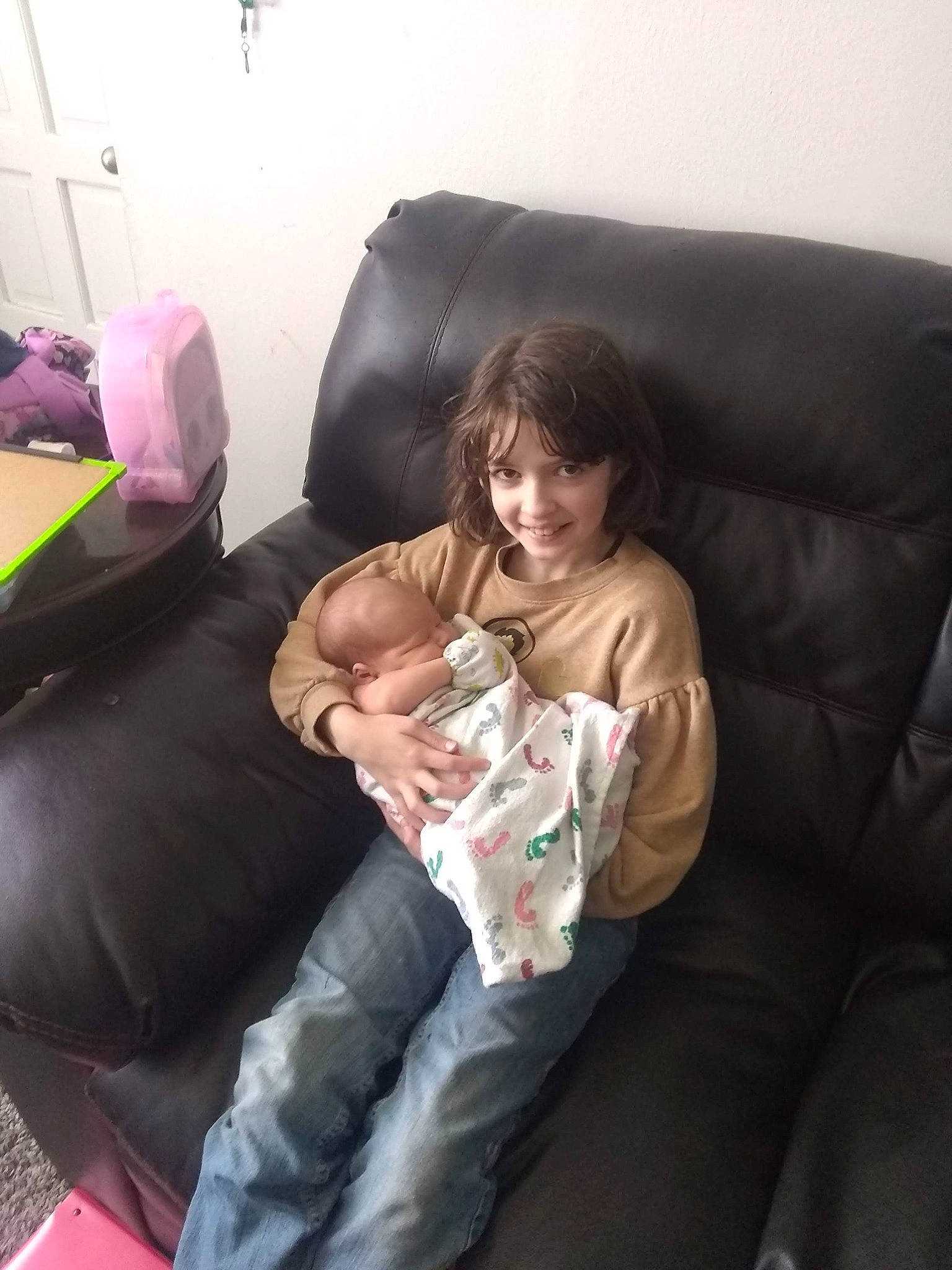 Kodie joined the competition — help win amazing prizes! baby, child, comfort, couch, electronic_device, family, finger, fun, furniture, joy, lap, leg, leisure, mobile_phone, person, play, sitting, toddler, vacation