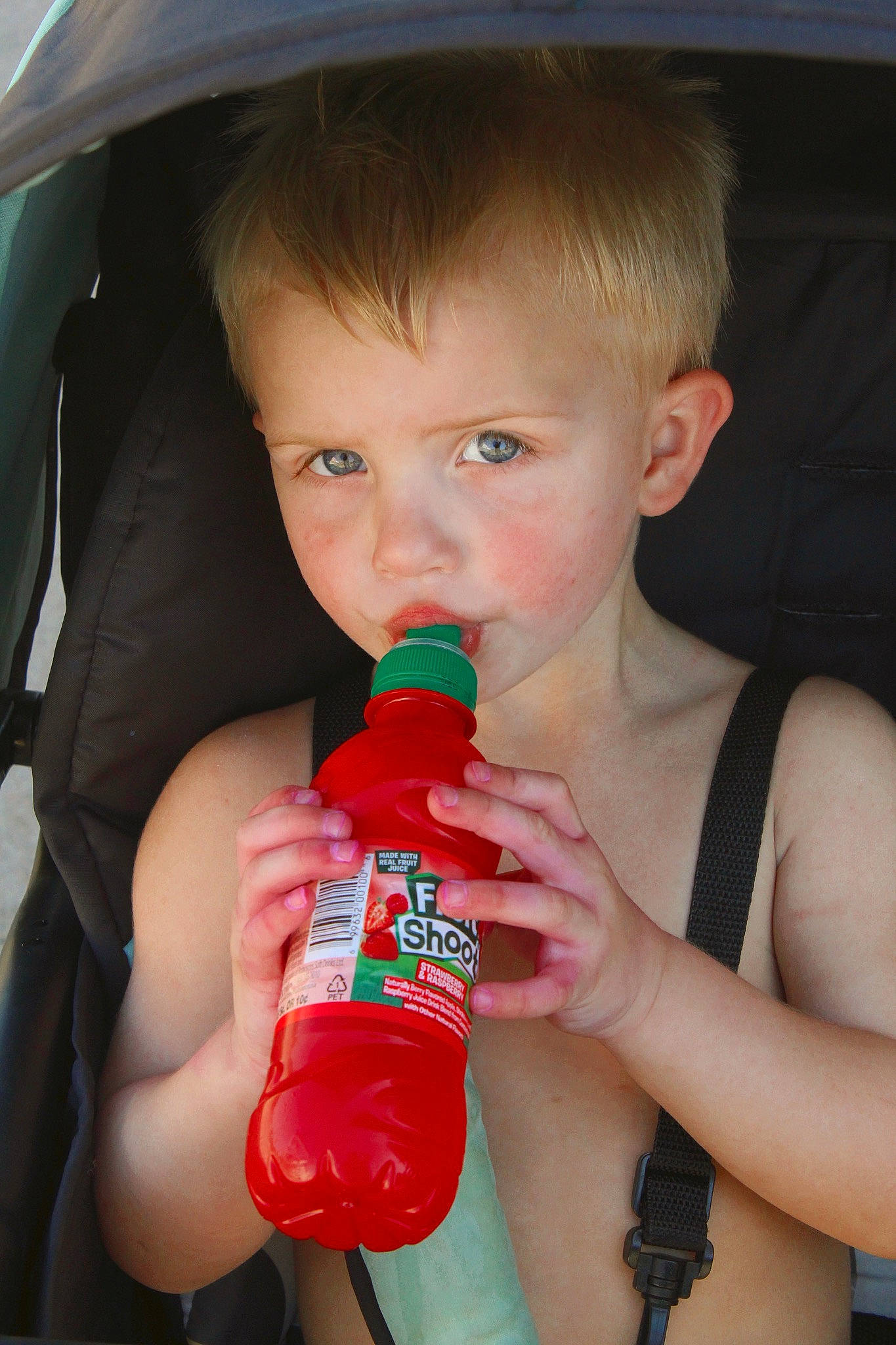 Kylan is registered to the contest to win money with this photo: baby_products, beauty, bottle, child, drink, drinking, drinkware, facial_expression, finger, fun, hand, happy, nail, organ, person, plastic_bottle, product, skin, summer, toddler