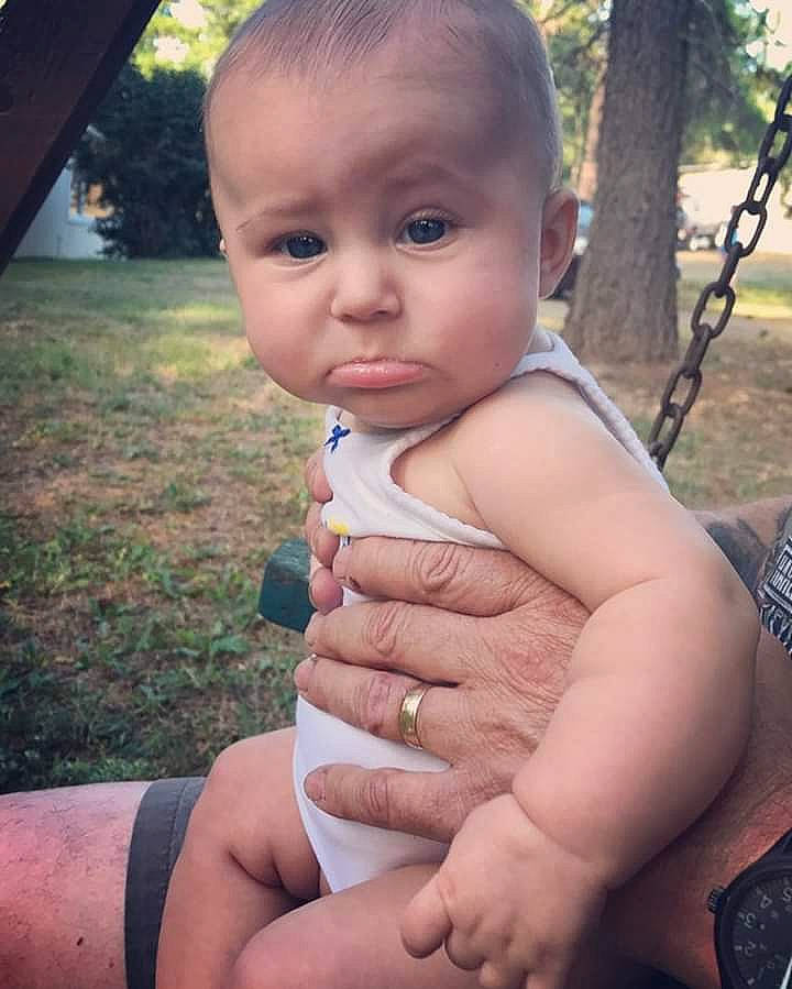 Elisabeth is registered to the contest to win money with this photo: abdomen, baby, cheek, child, eye, face, finger, grass, hand, head, leg, muscle, person, sitting, skin, smile, summer, thumb, toddler, trunk