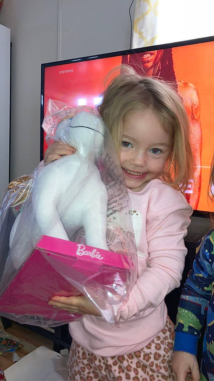 Paisley is registered to the contest to win money with this photo: baby_toddler_clothing, cable_television, child, display_device, event, flat_panel_display, fun, happy, holiday, iris, joy, led_backlit_lcd_display, magenta, person, picture_frame, pink, room, smile, television, television_set