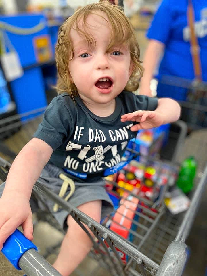 Brycen is registered to the contest to win money with this photo: bicycle, bicycle_fork, bicycle_frame, bicycle_handlebar, bicycle_tire, bicycles_equipment_and_supplies, blue, child, fun, hairstyle, happy, leisure, person, photograph, product, recreation, shorts, sportswear, standing, t_shirt