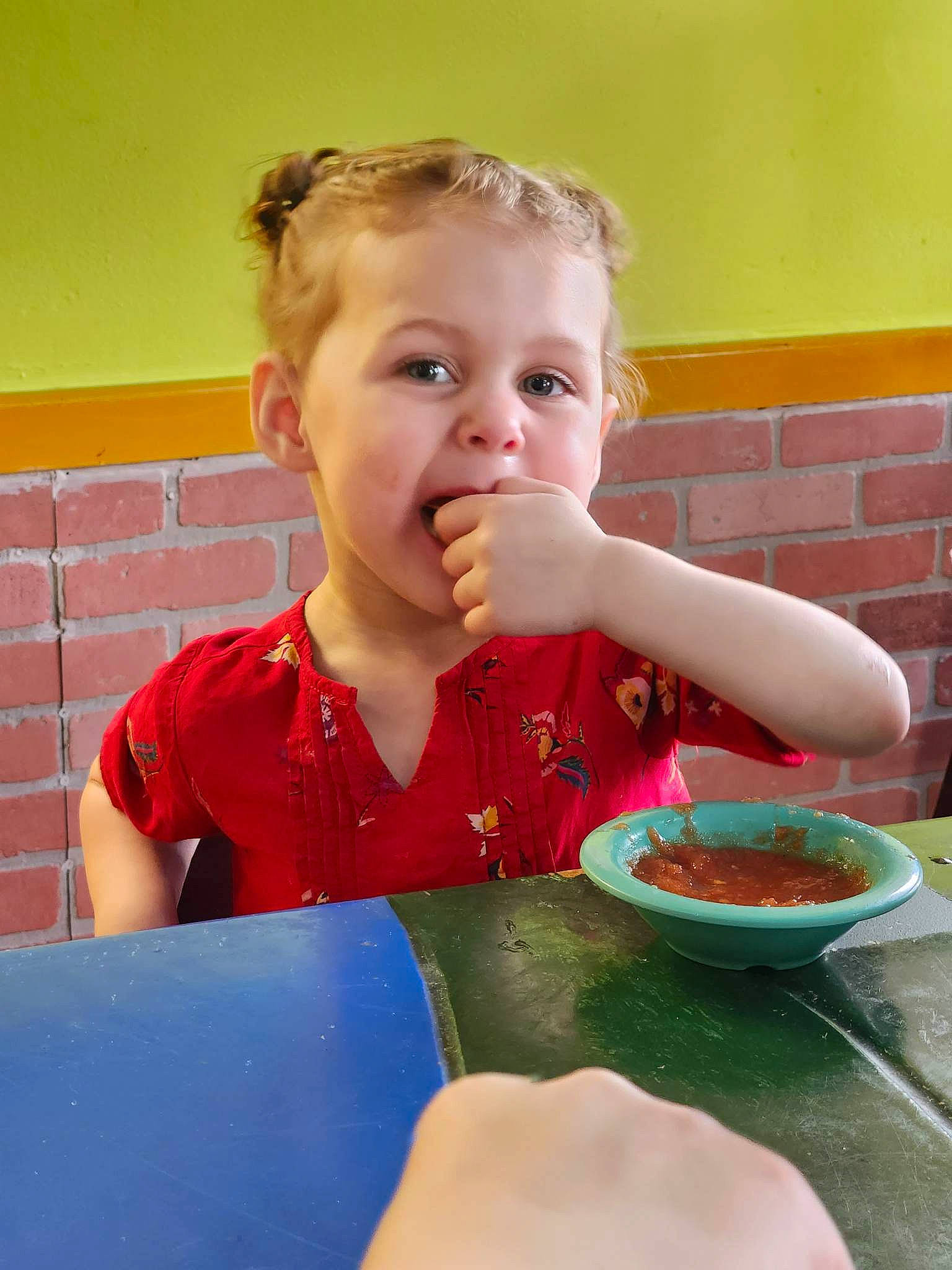 Vivian joined the competition — help win amazing prizes! arm, bowl, chair, child, comfort_food, dishware, finger, food, food_craving, fun, ingredient, leisure, person, plate, recipe, sitting, spoon, t_shirt, table, tableware