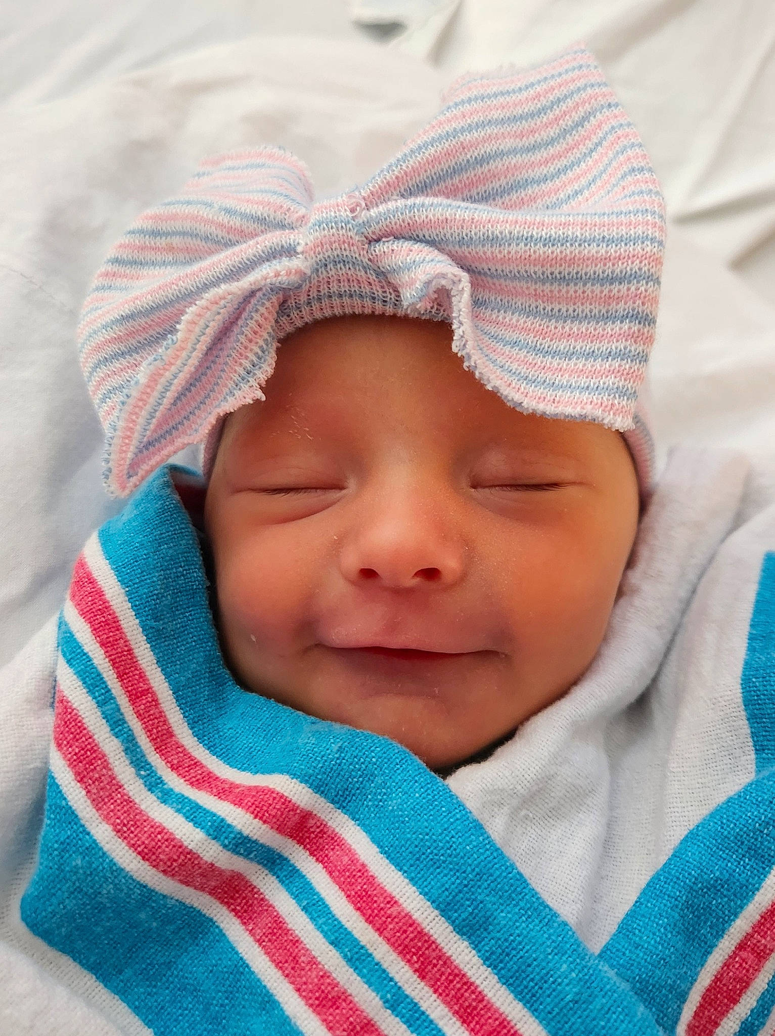 Delilah joined the competition — help win amazing prizes! baby, baby_toddler_clothing, cheek, child, chin, comfort, eyebrow, face, fashion_accessory, grass, happy, hat, headwear, linens, lip, pattern, person, skin, sleeve, smile