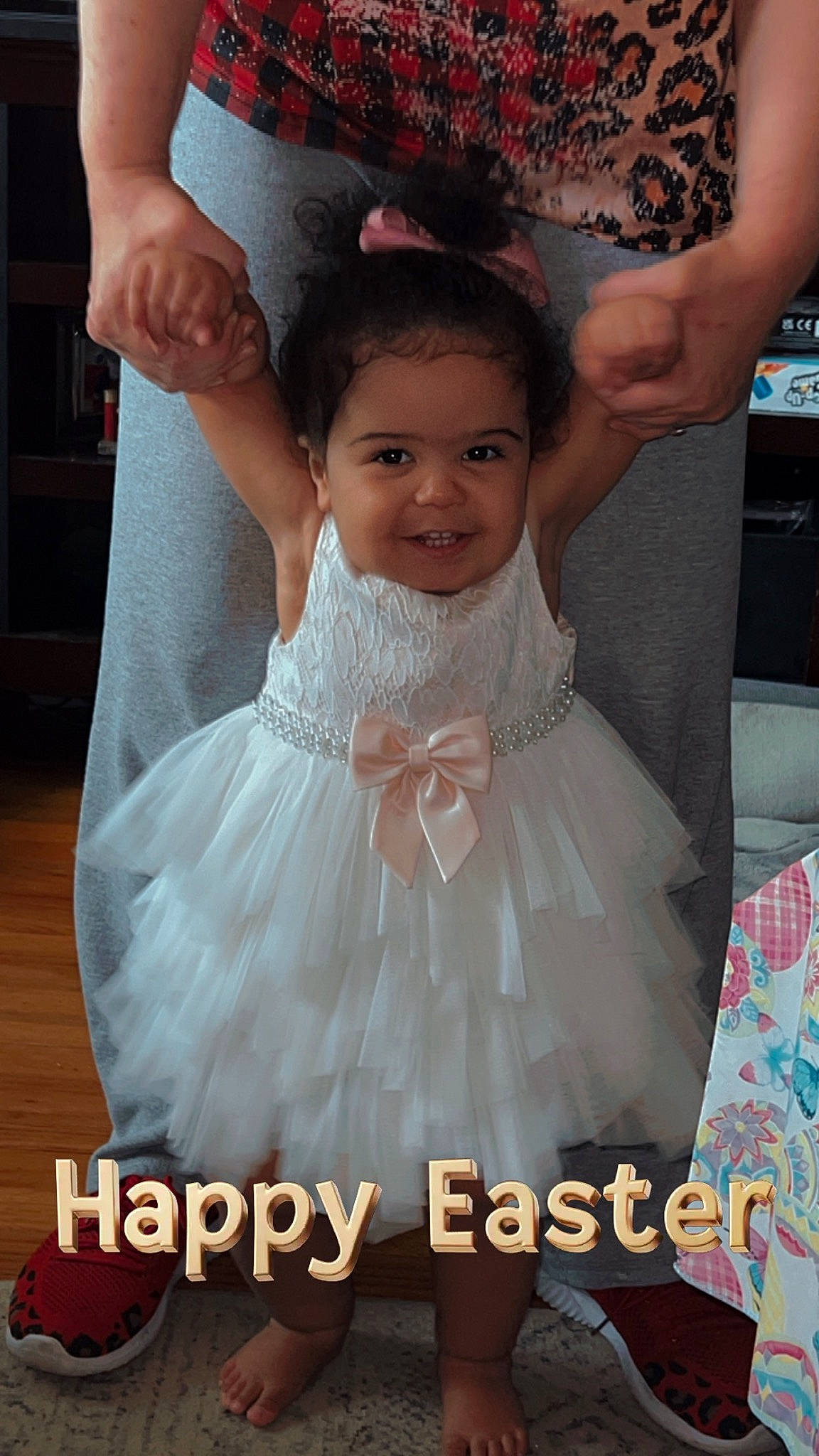 Khloe is registered to the contest to win money with this photo: arm, baby_toddler_clothing, bridal_party_dress, dress, embellishment, eyelash, face, finger, gesture, gown, hair, hairstyle, happy, head, headpiece, joy, person, pink, shoulder, sleeve