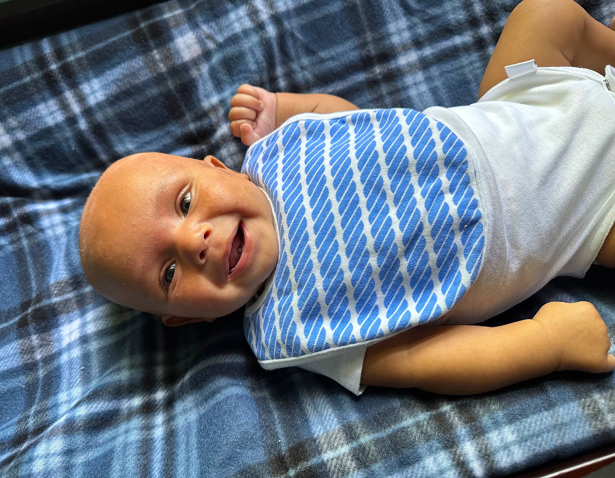 Kyson is registered to the contest to win money with this photo: baby, baby_toddler_clothing, blue, child, comfort, dress_shirt, elbow, gesture, human_leg, linens, pattern, person, plaid, portrait_photography, sitting, sleeve, tartan, textile, toddler, wood
