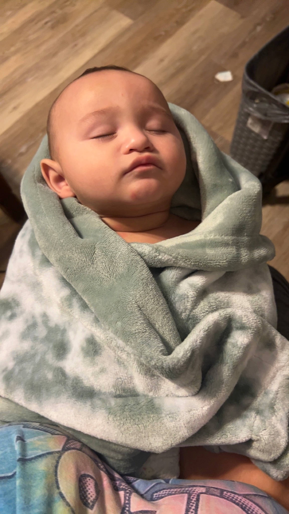 Grayson is registered to the contest to win money with this photo: baby, cheek, child, chin, comfort, human, linens, person, room, skin, sleeve, textile, toddler, wrap, wrinkle