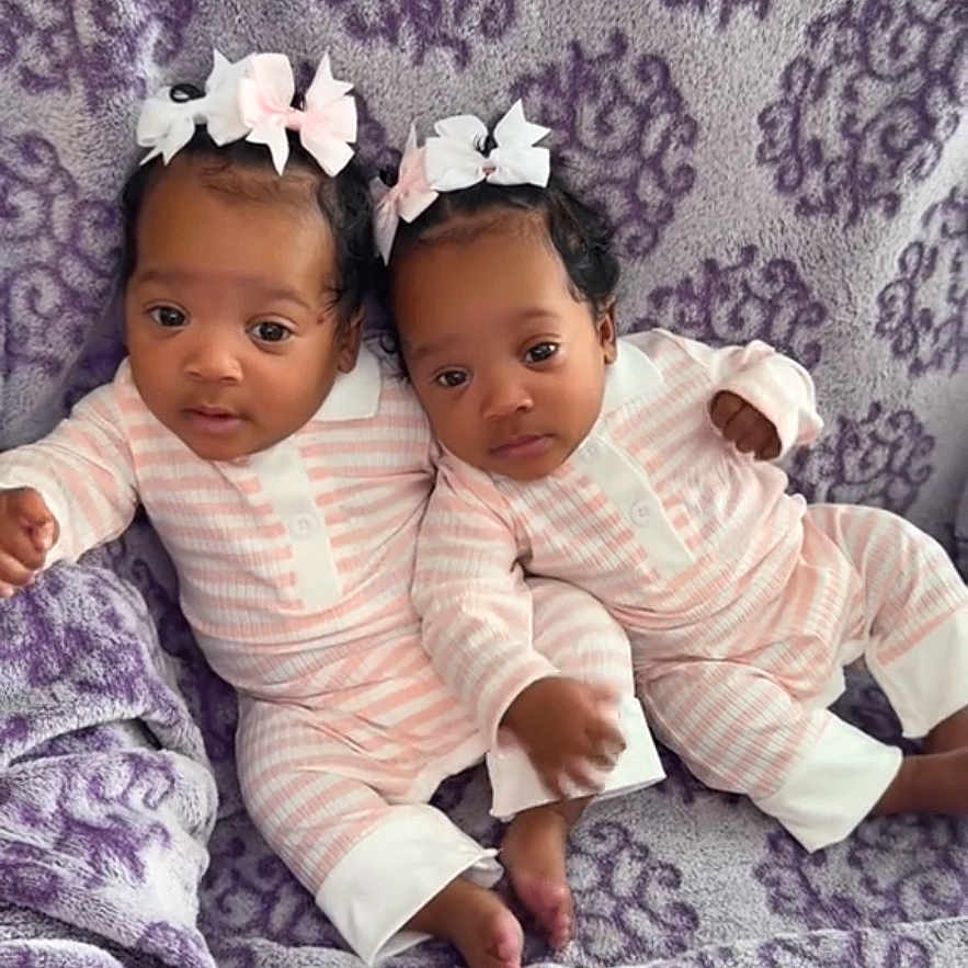 Alayia Alonei joined the competition — help win amazing prizes! adorable, baby, blanket, bow, child, comfort, cute, headband, indoor, infant, lying_down, pajamas, pattern, portrait, purple, sleepwear, soft_texture, toddler, twins, two_children