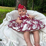 Elizabeth joined the competition — help win amazing prizes! baby, child, dress, bow, headband, blanket, outdoor, tree, grass, forest, nature, smiling, happy, cute, infant, feet, person, portrait, sitting, clothing