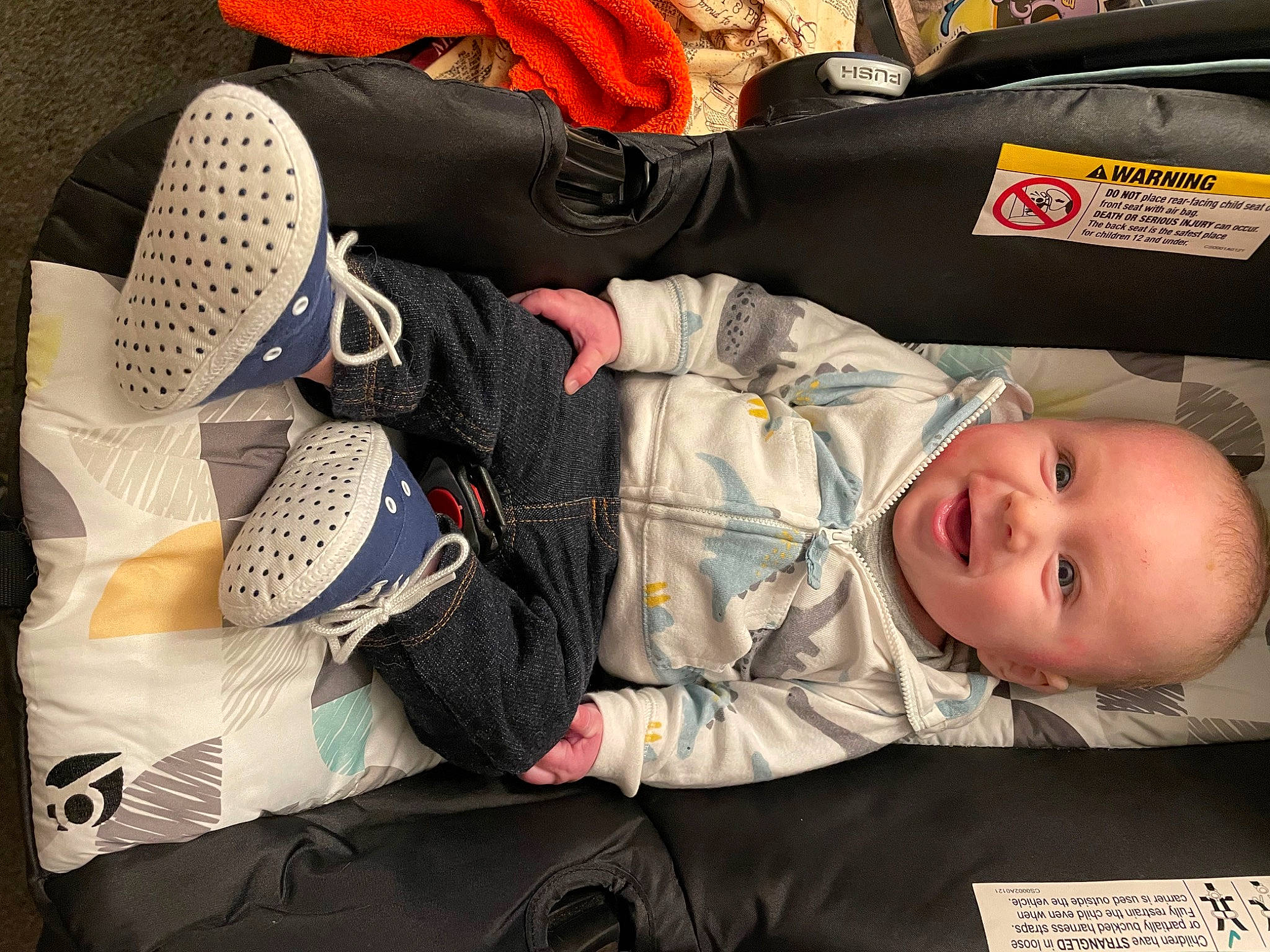 Emmett joined the competition — help win amazing prizes! athletic_shoe, baby, baby_carriage, baby_products, baby_toddler_clothing, bag, baggage, carmine, child, comfort, luggage_and_bags, nap, outdoor_shoe, person, sitting, smile, sportswear, suit, textile, toddler