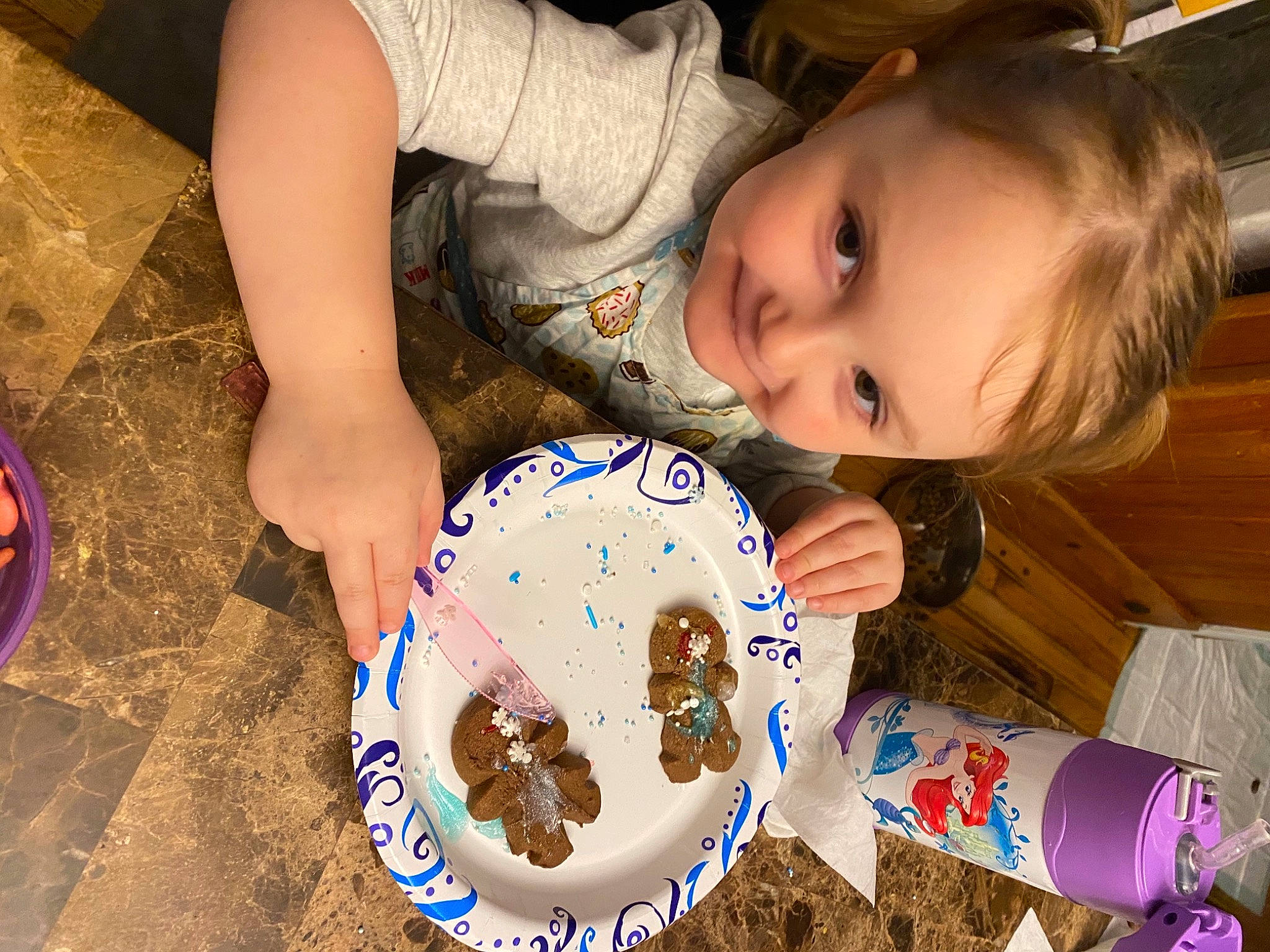 Talia joined the competition — help win amazing prizes! baked_goods, baking, child, comfort_food, cookies_and_crackers, cuisine, dessert, finger_food, food_craving, human, icing, nail, person, plastic_bottle, plate, snack, sweetness, taste