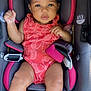 baby, child, car_seat, infant, girl, pink, gray, clothing, seatbelt, cute, adorable, portrait, young_child, headband, sitting, safety, infant_clothing, seat, young_baby, person