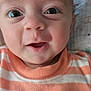 Silas joined the competition — help win amazing prizes! baby, close_up, face, eyes, infant, child, portrait, smile, striped_shirt, orange, white, cute, skin, head, expression, young, adorable, person, clothing, background