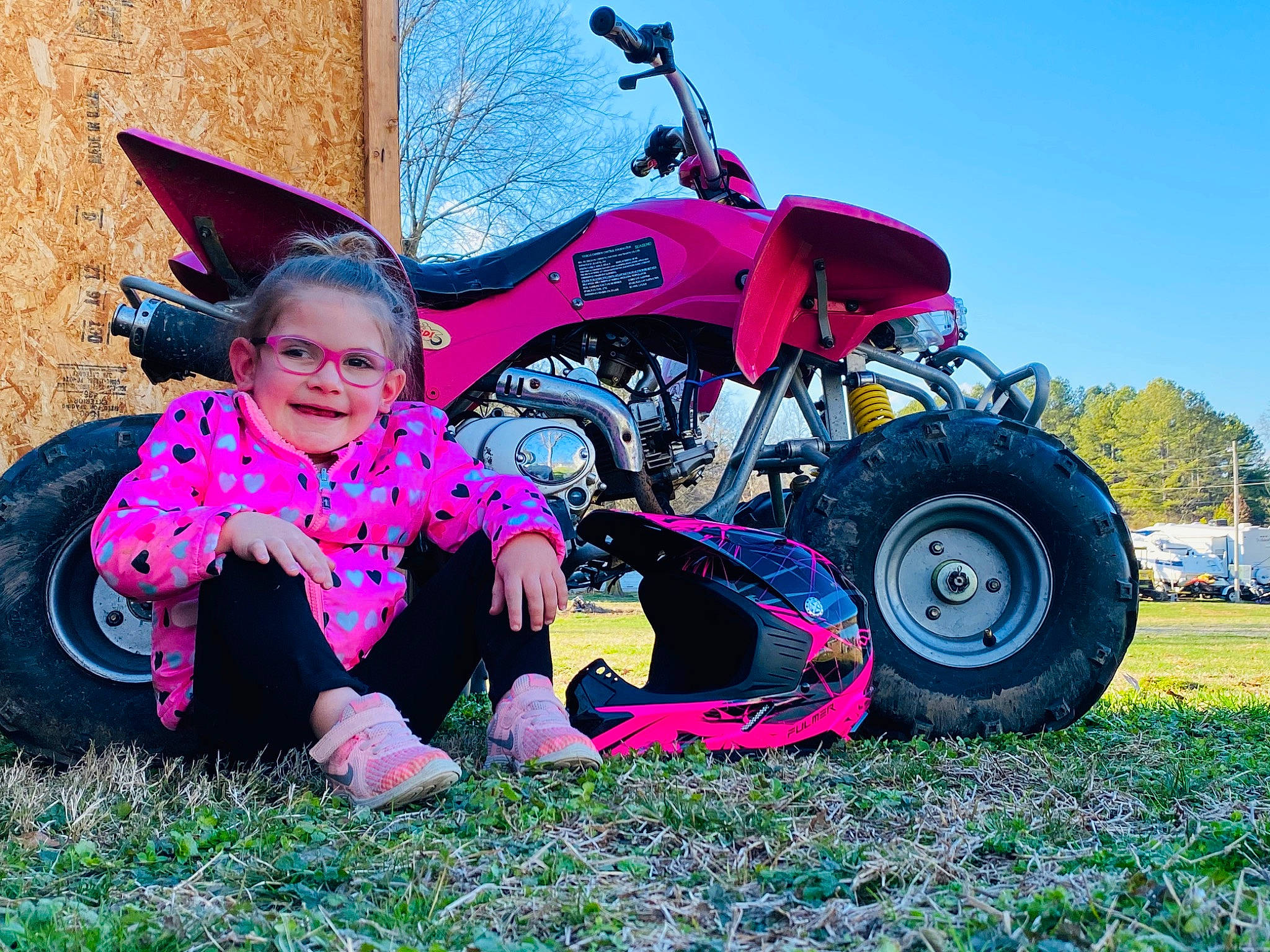 Annaleigh joined the competition — help win amazing prizes! all_terrain_vehicle, auto_part, automotive_design, automotive_tire, automotive_wheel_system, car, child, fun, grass, joy, person, photography, pink, plant, purple, rim, tire, toddler, vehicle, wheel