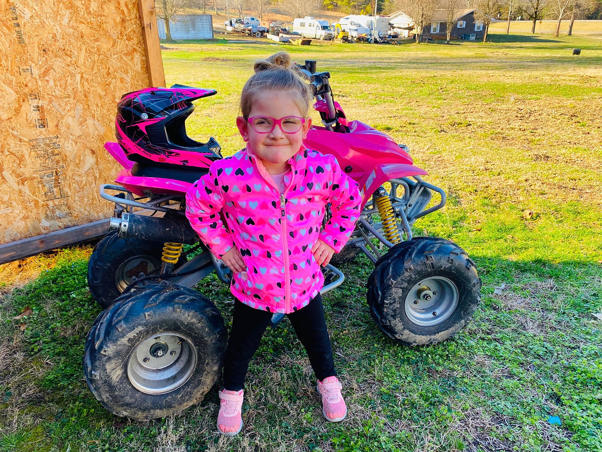 Annaleigh joined the competition — help win amazing prizes! automotive_tire, automotive_wheel_system, car, child, fun, grass, joy, person, pink, plant, play, riding_toy, smile, toddler, vehicle, wheel