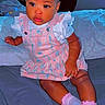 Mulani is registered to the contest to win money with this photo: baby, child, toddler, portrait, sitting, bed, bedroom, pink_dress, dress, socks, leopard_print, blanket, window, curtain, indoor, dark_skin, serious_expression, face, photography, cute