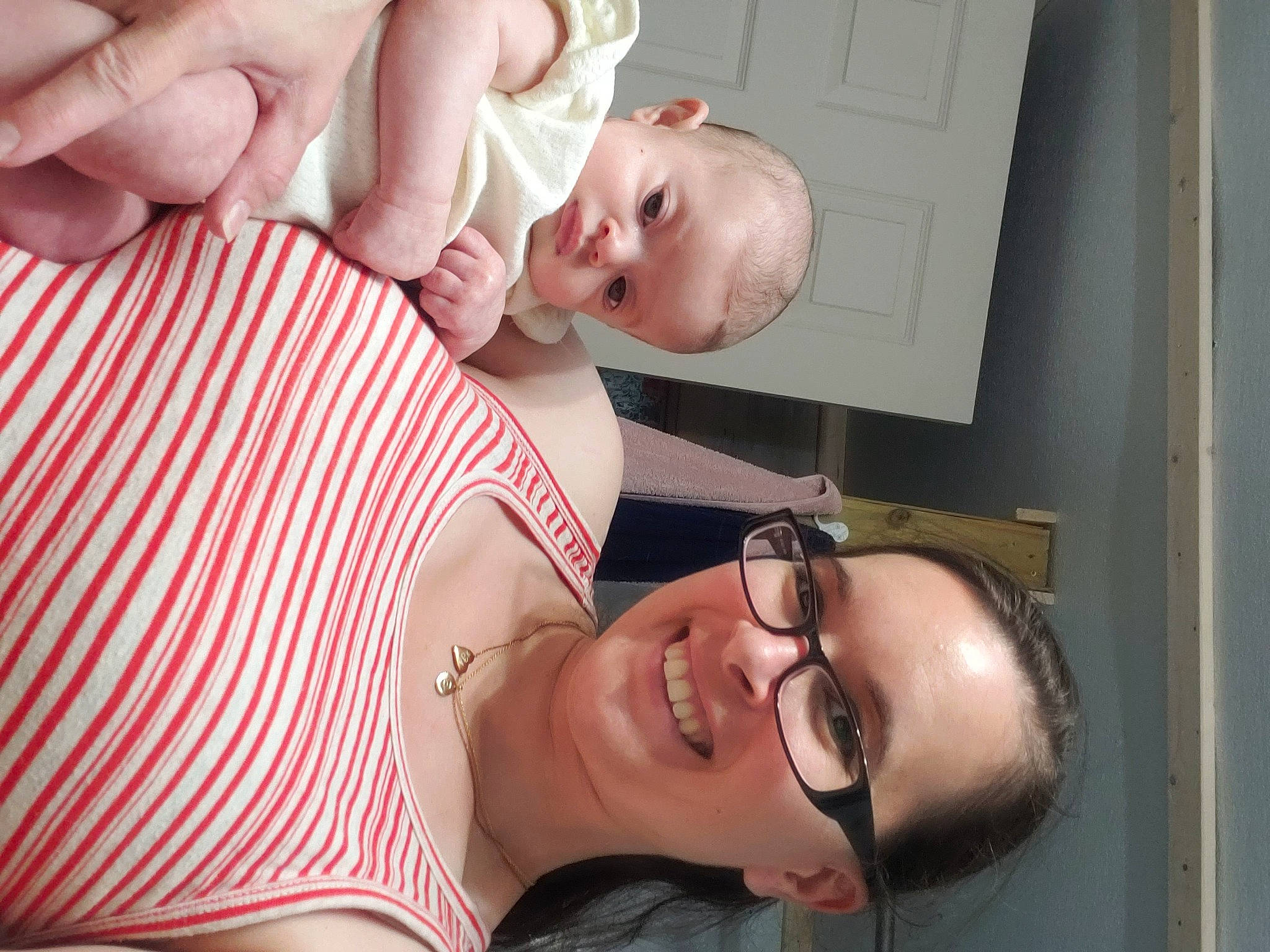 Evie is registered to the contest to win money with this photo: arm, baby, cheek, facial_expression, finger, gesture, happy, human, joy, mammal, mouth, muscle, nose, organ, person, photograph, pink, skin, smile, toddler