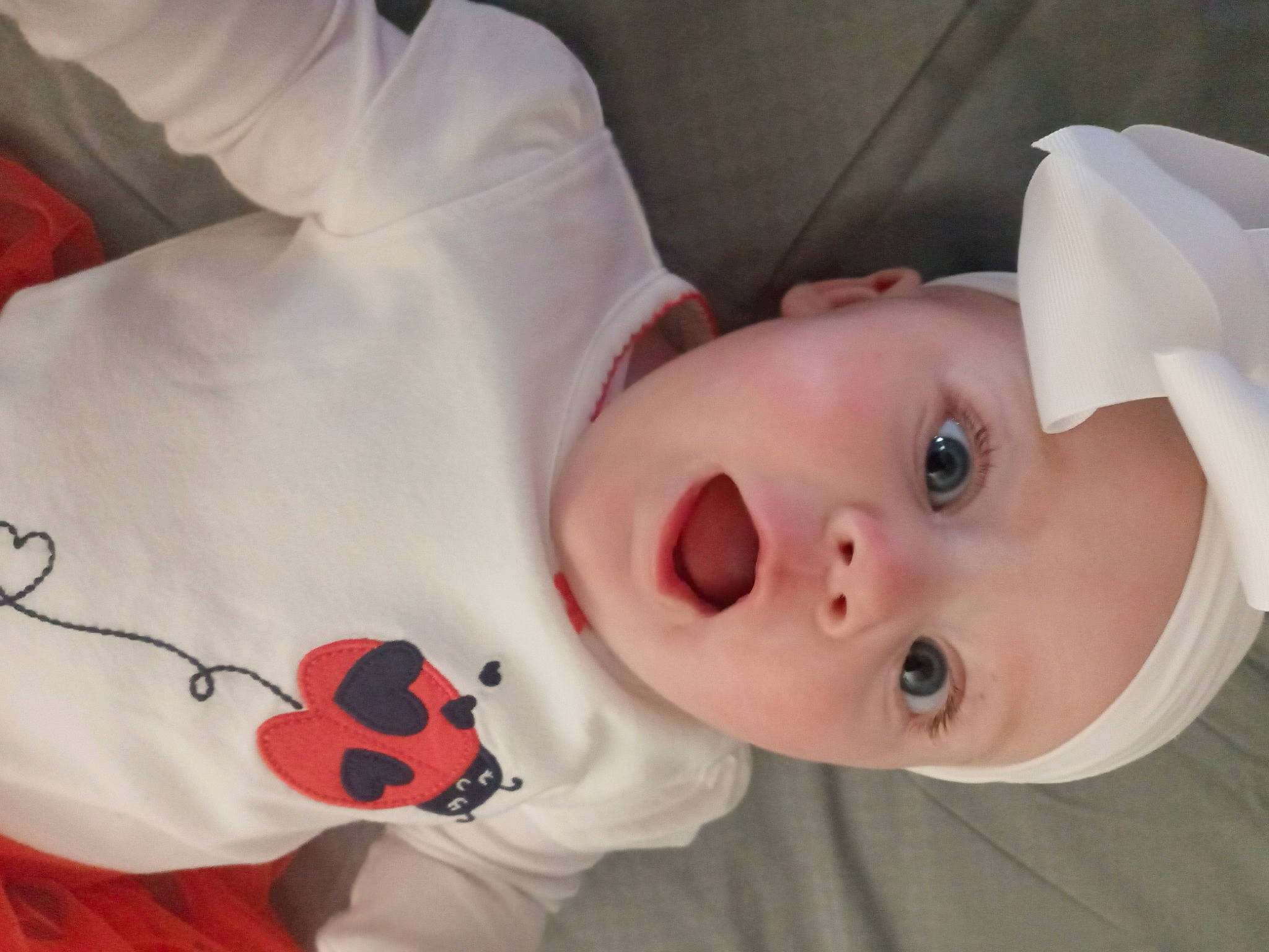 Adalynn joined the competition — help win amazing prizes! baby, baby_toddler_clothing, carmine, cheek, child, chin, comfort, eyebrow, eyelash, hat, headwear, lip, mouth, neck, nose, pattern, person, plant, room, sleeve