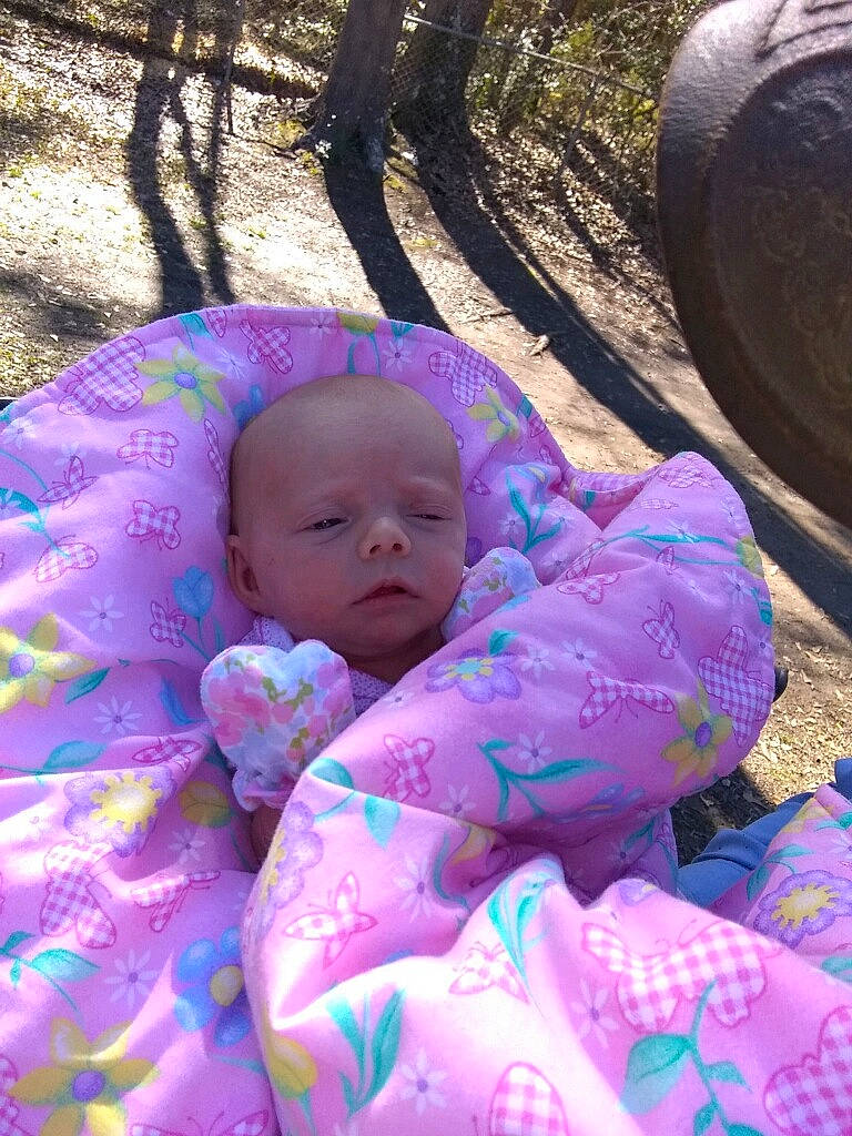 Allison joined the competition — help win amazing prizes! automotive_tire, baby, baby_toddler_clothing, child, comfort, eye, face, fun, grass, head, leaf, leisure, magenta, people_in_nature, person, pink, plant, purple, recreation, toddler