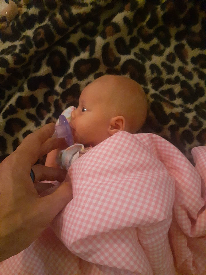 Allison joined the competition — help win amazing prizes! baby, baby_products, baby_sleeping, baby_toddler_clothing, bedding, bedtime, cheek, comfort, finger, gesture, human_body, linens, mouth, nose, pattern, person, room, skin, sleeve, thumb