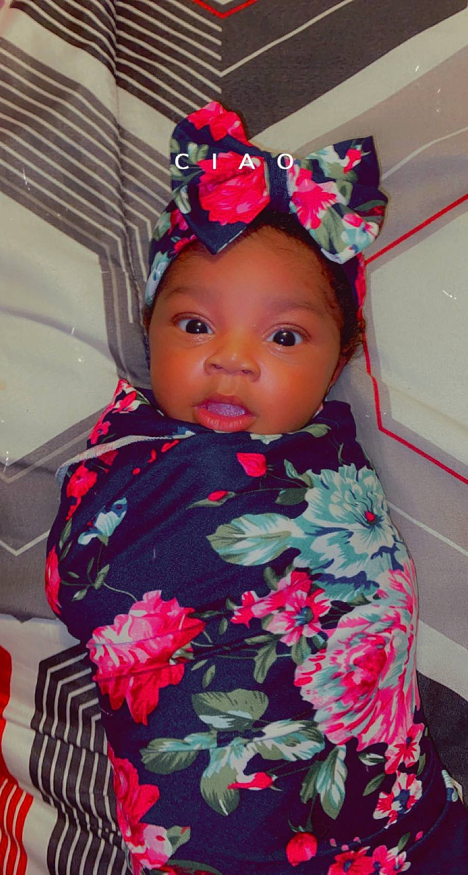 Ryleigh joined the competition — help win amazing prizes! baby_toddler_clothing, cap, chin, clothing, dress, eye, eyebrow, eyelash, face, hair, head, lip, magenta, outerwear, pattern, person, pink, red, sleeve, textile