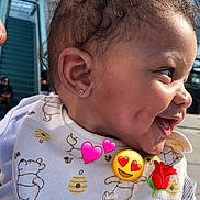 Hazellbelle is registered to the contest to win money with this photo: baby, child, smiling, side_profile, bib, outdoor, sunlight, curly_hair, earring, building, window, stairs, person, cute, dimples, happy, infant, wearing_clothes, daylight, emoji