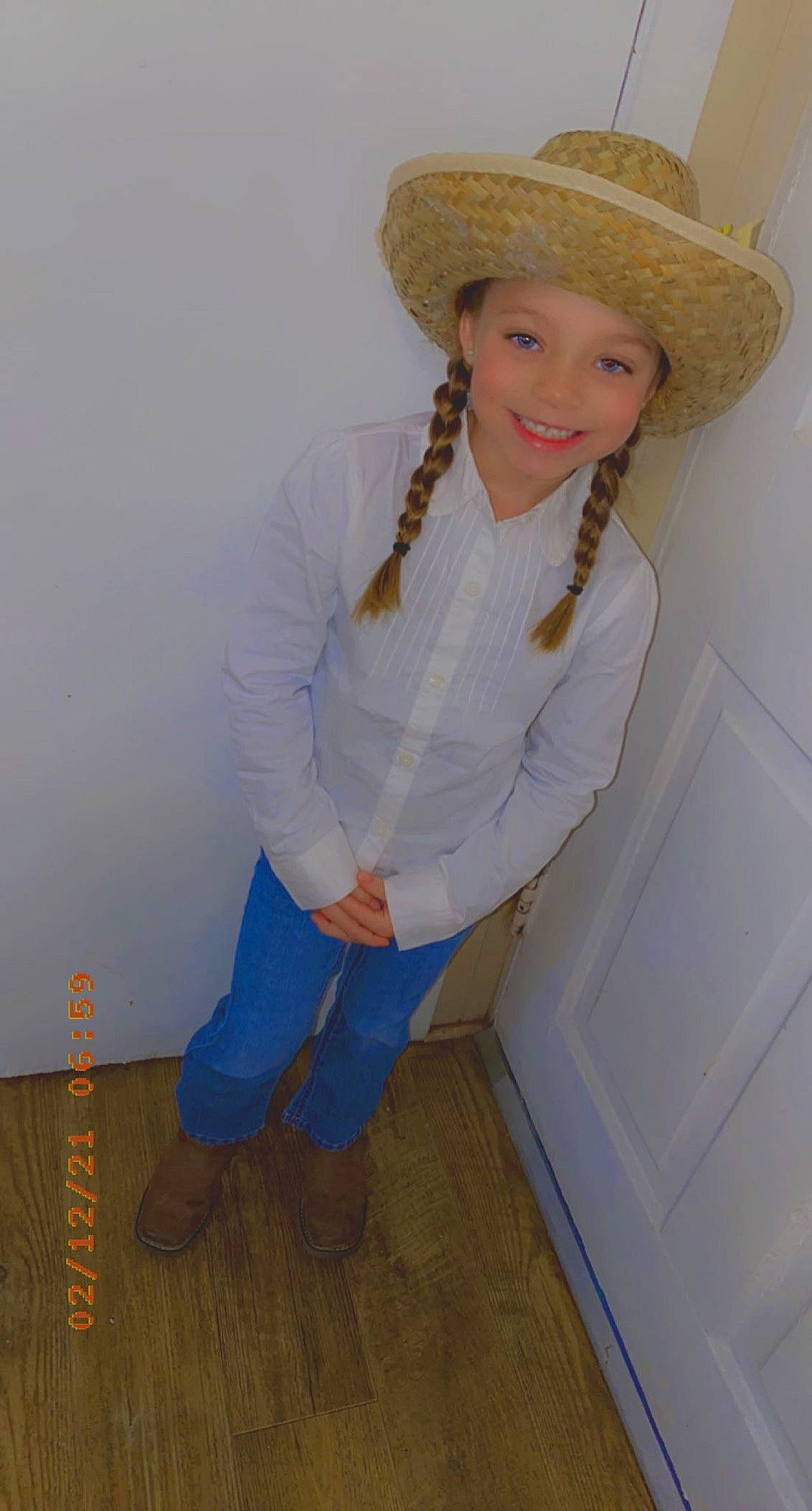 Kyndall joined the competition — help win amazing prizes! arm, cap, costume_hat, cowboy_hat, electric_blue, fashion_design, flooring, fun, happy, hardwood, hat, headgear, headwear, human_leg, jeans, joy, knee, person, sleeve, smile