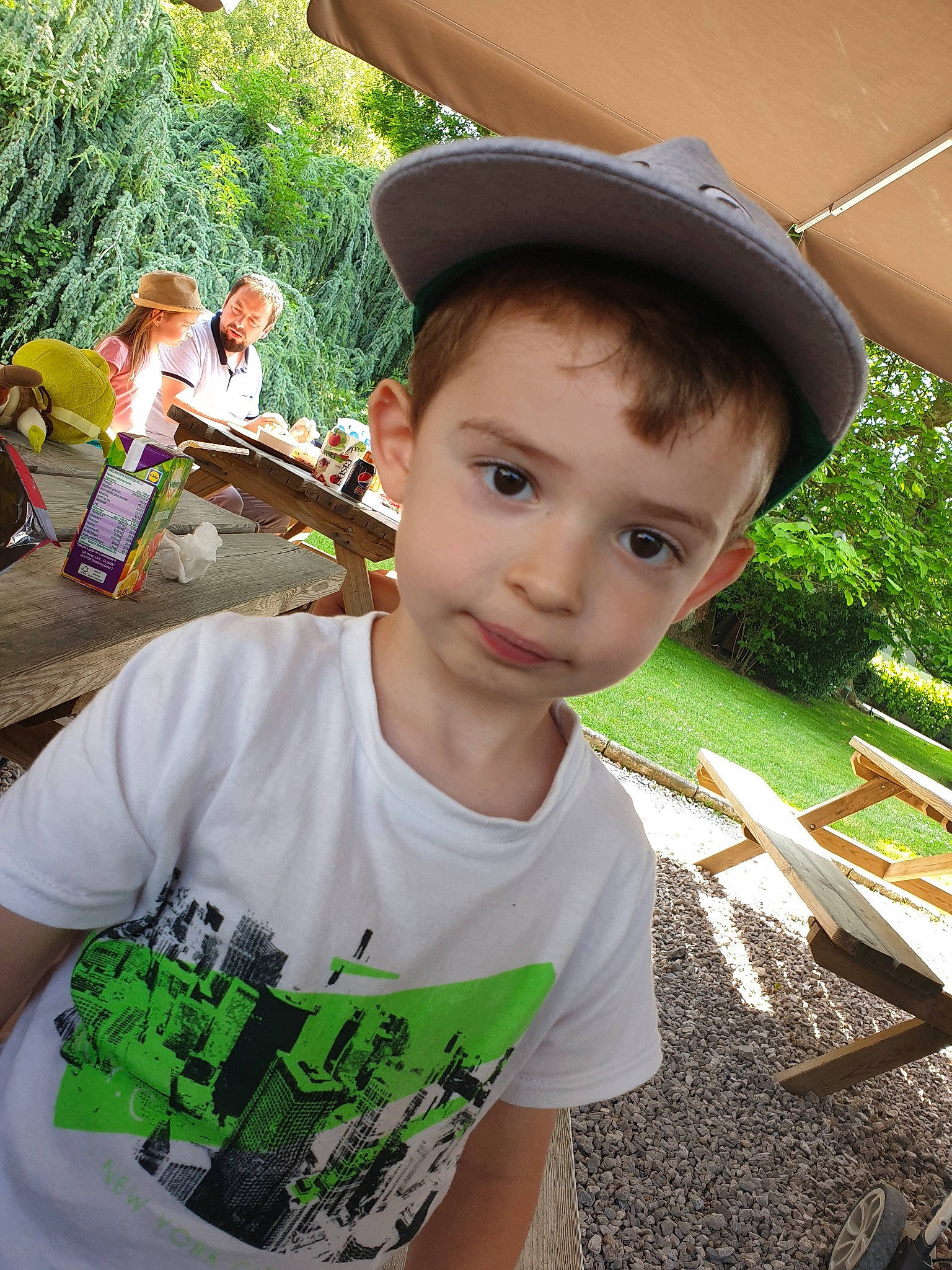 Nollan participe au concours pour gagner de l'argent avec cette photo : child, cool, fun, grass, green, hat, headgear, person, plant, play, smile, summer, toddler