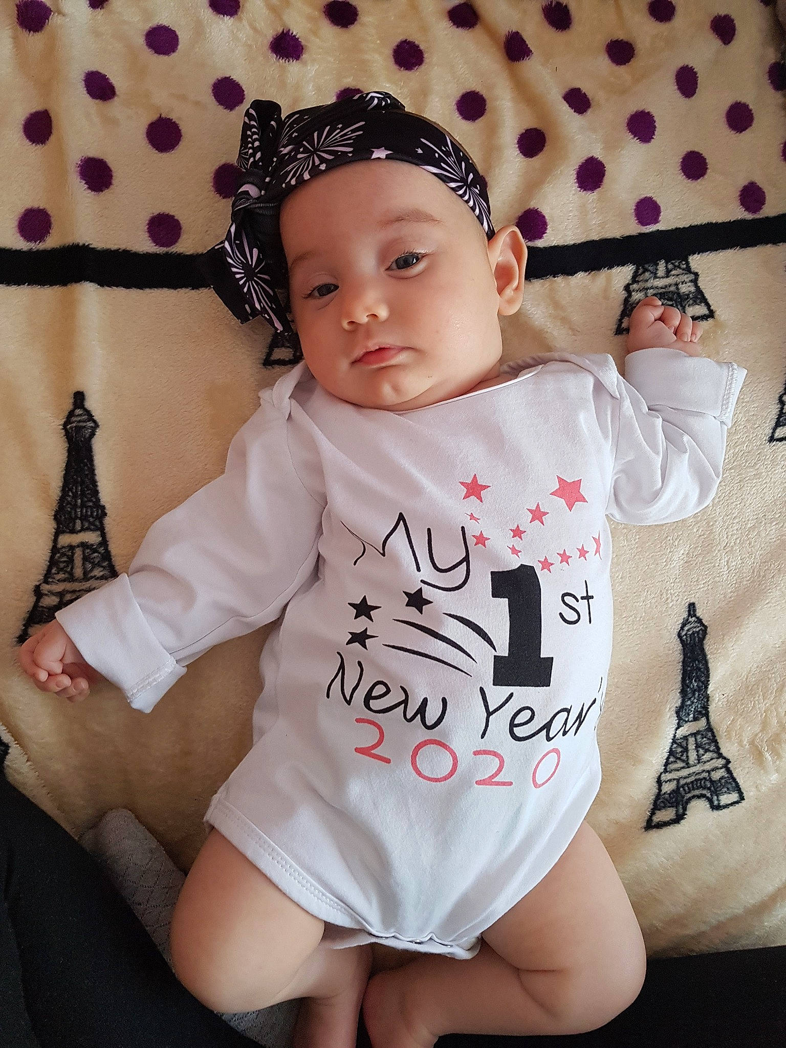 Melania joined the competition — help win amazing prizes! baby, baby_bloomers, baby_products, baby_toddler_clothing, cheek, child, design, fashion_accessory, headgear, headwear, pattern, person, photography, pink, polka_dot, product, sleeve, t_shirt, toddler