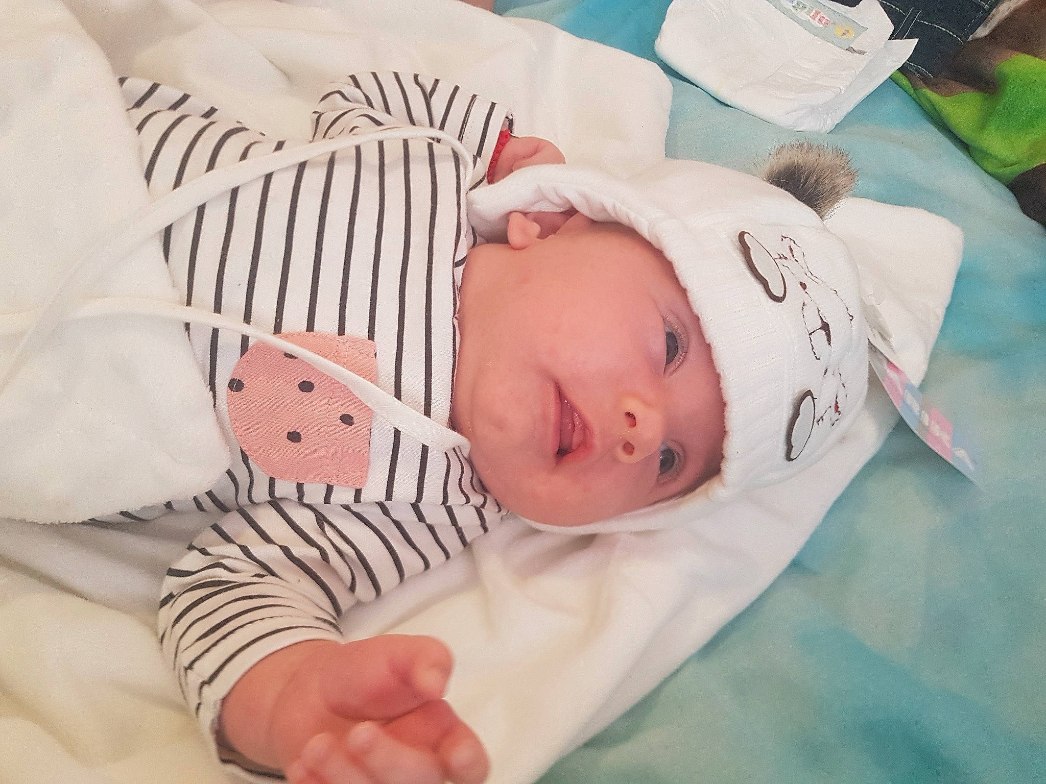 Melania is registered to the contest to win money with this photo: baby, baby_products, baby_safety, baby_sleeping, baby_toddler_clothing, bedtime, birth, cheek, child, head, headwear, infant_bed, nap, person, product, skin, sleep, toddler