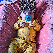 Hazel joined the competition — help win amazing prizes! baby, bed, blanket, bodypart, bonnet, clothing, couch, cushion, face, finger, furniture, hand, hat, head, homedecor, person, photography, portrait, purple, sleeping