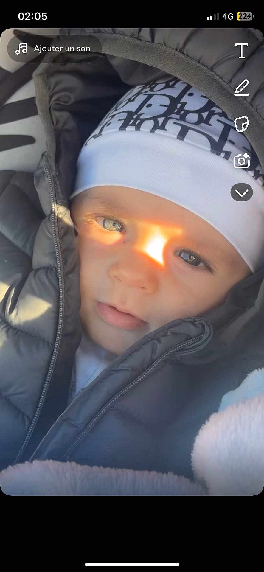 Djayden participe au concours pour gagner de l'argent avec cette photo : baby, blanket, blue_eyes, child, closeup, cozy, face, hat, headwear, infant, jacket, outdoor, portrait, puffy_jacket, soft_texture, sunlight, warm_light, winter_clothing, young_child, zipper
