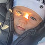 Djayden participe au concours pour gagner de l'argent avec cette photo : baby, blanket, blue_eyes, child, closeup, cozy, face, hat, headwear, infant, jacket, outdoor, portrait, puffy_jacket, soft_texture, sunlight, warm_light, winter_clothing, young_child, zipper