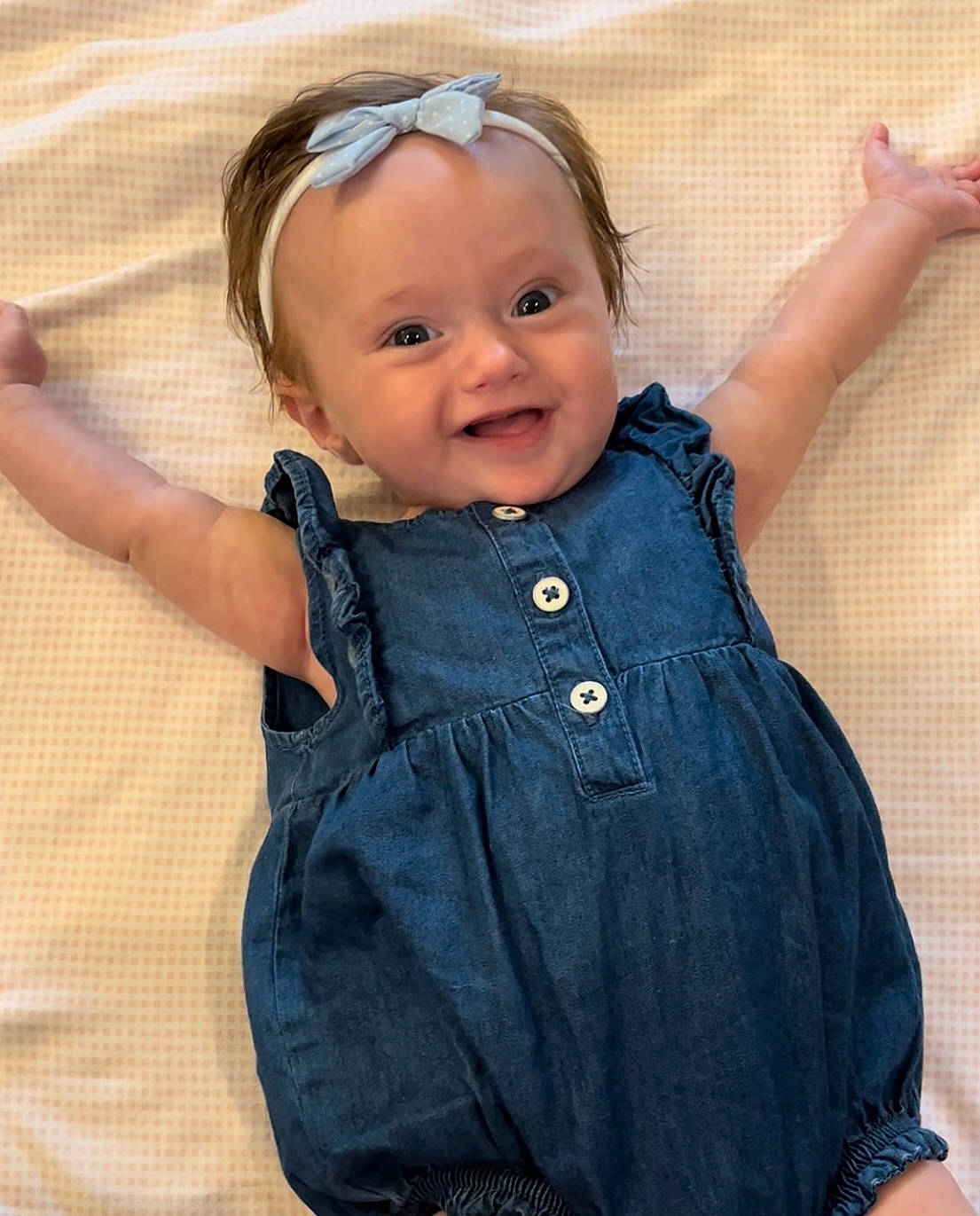 Raegan joined the competition — help win amazing prizes! arm, baby_toddler_clothing, cheek, collar, face, facial_expression, finger, gesture, hair, happy, head, headwear, neck, nose, outerwear, person, shoulder, skin, sleeve, smile