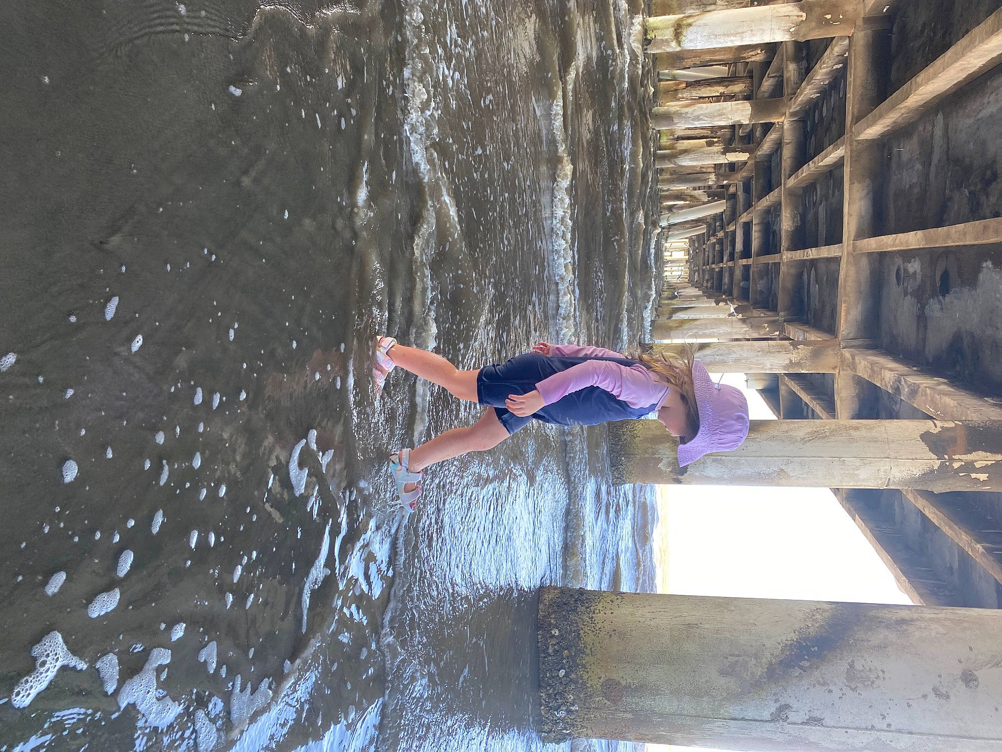 Guinevere is registered to the contest to win money with this photo: beam, concrete, electric_blue, fun, landscape, leisure, lumber, person, recreation, reflection, tree, water, water_feature, wood