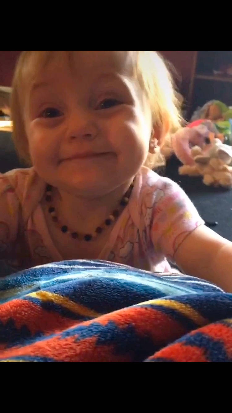 Coraline is registered to the contest to win money with this photo: baby, cheek, child, eating, face, head, joy, mouth, person, play, smile, toddler