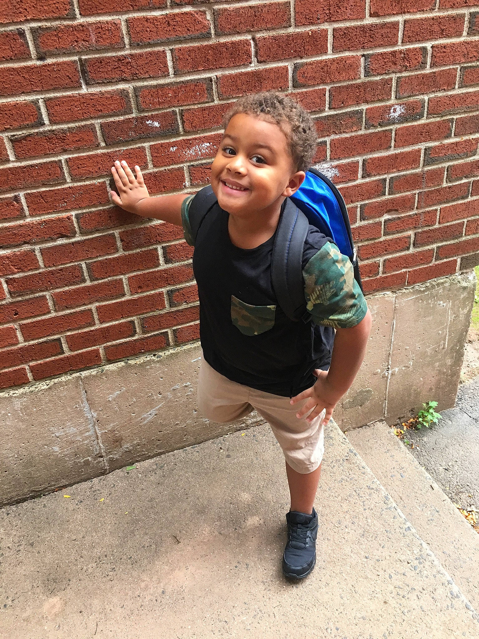 Amir joined the competition — help win amazing prizes! brick, brickwork, child, cool, denim, footwear, glasses, jeans, joint, joy, leg, person, photography, shoe, t_shirt, toddler, vacation, wall