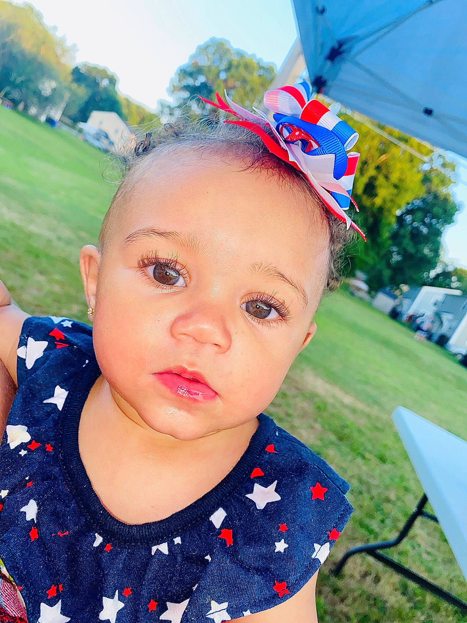 Aubree joined the competition — help win amazing prizes! baby, cheek, child, close_up, ear, eye, face, forehead, grass, hair_accessory, head, headgear, lip, nose, person, pink, skin, summer, toddler, tree