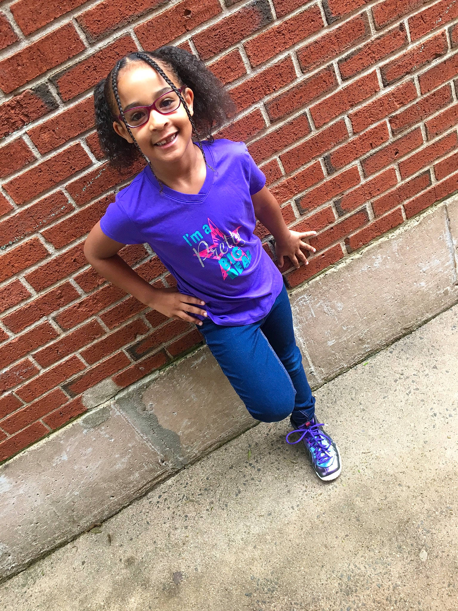 Aziah is registered to the contest to win money with this photo: blue, cool, electric_blue, eyewear, footwear, fun, glasses, happy, joint, joy, leg, leisure, nose, person, pink, purple, recreation, smile, sportswear, standing