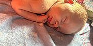 Dakota joined the competition — help win amazing prizes! baby, sleeping, newborn, blanket, soft, peaceful, infant, skin, face, hand, fingers, light, sunlight, cozy, rest, cute, child, portrait, bedroom, comfort