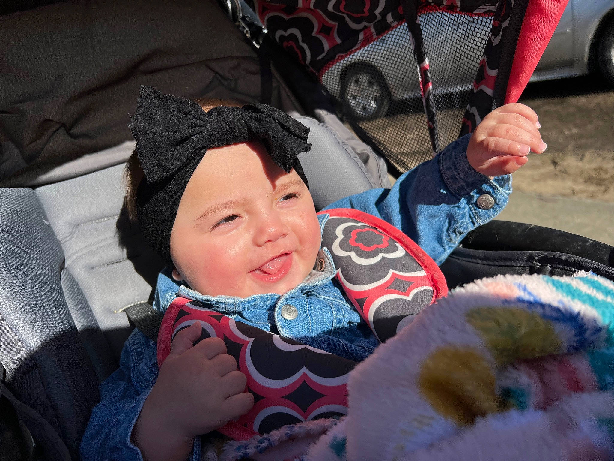 Alanna is registered to the contest to win money with this photo: auto_part, automotive_design, automotive_exterior, automotive_tire, automotive_wheel_system, baby, baby_carriage, baby_products, car, car_seat, event, fun, happy, headwear, motor_vehicle, person, skin, smile, tire, toddler